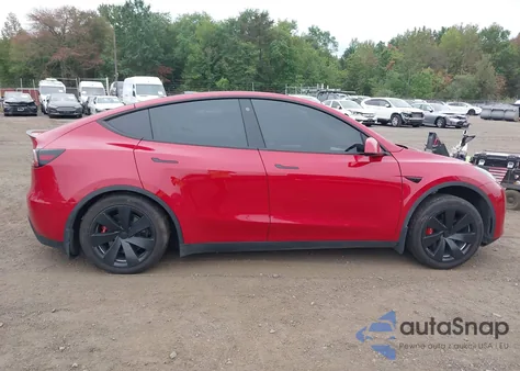 2022 Tesla Model Y Long Range Dual Motor All-Wheel Drive z USA, uszkodzony, nr VIN 7SAYGDEE4NF517341